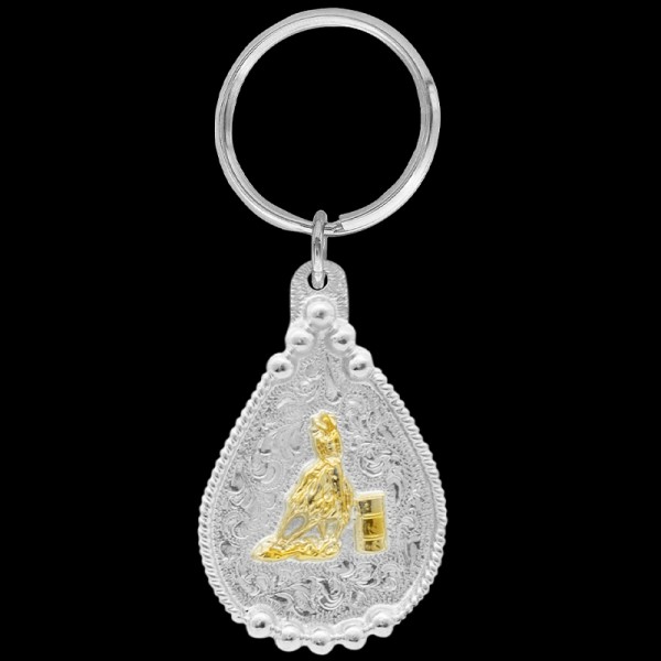 Capture the essence of the rodeo with our Golden Barrel Racer Keychain. Ideal for cowgirls and rodeo enthusiasts, shop now and infuse your keychain collection with Western elegance.
